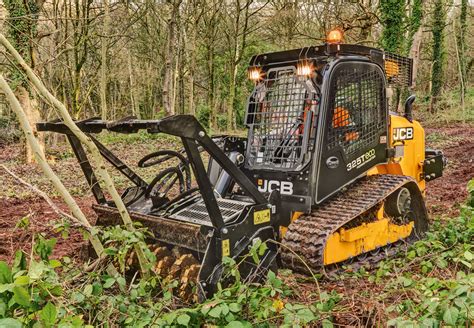 brush cutting uneven ground with a skid steeer|john deere skid steer brush cutting.